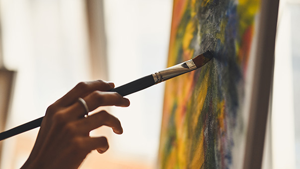 hand painting with brush on canvas