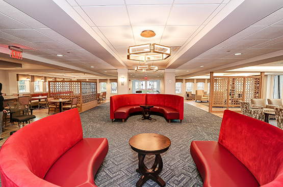 lobby area with large red couches