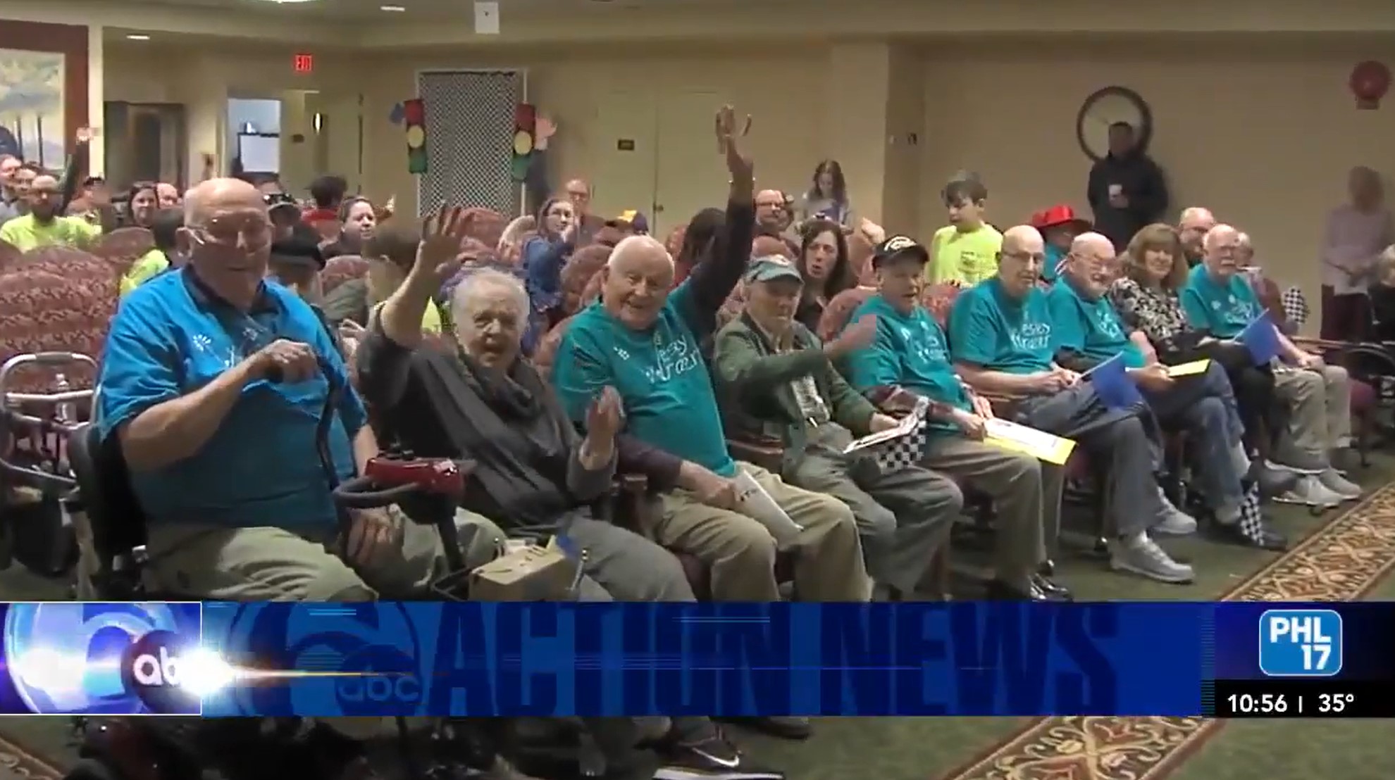 news clip of seniors at Pinewood Derby event