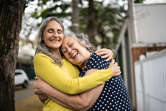 senior women hugging