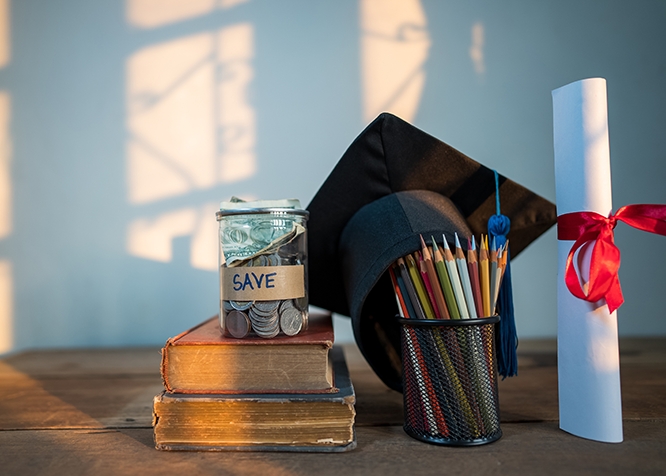 books, pencils, jar of money, and grad cap