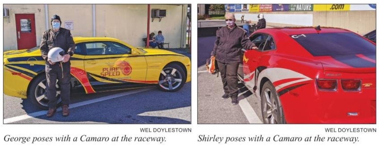 senior residents of WEL Doylestown pose in front of cars at the raceway as part of the WEL Wishes program
