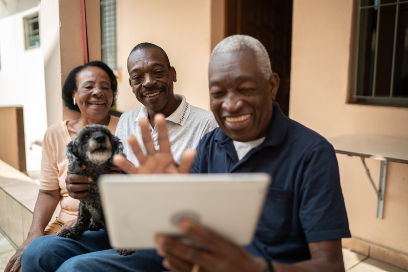 FAQs Black Famly IPad Dog IStock-1219530707