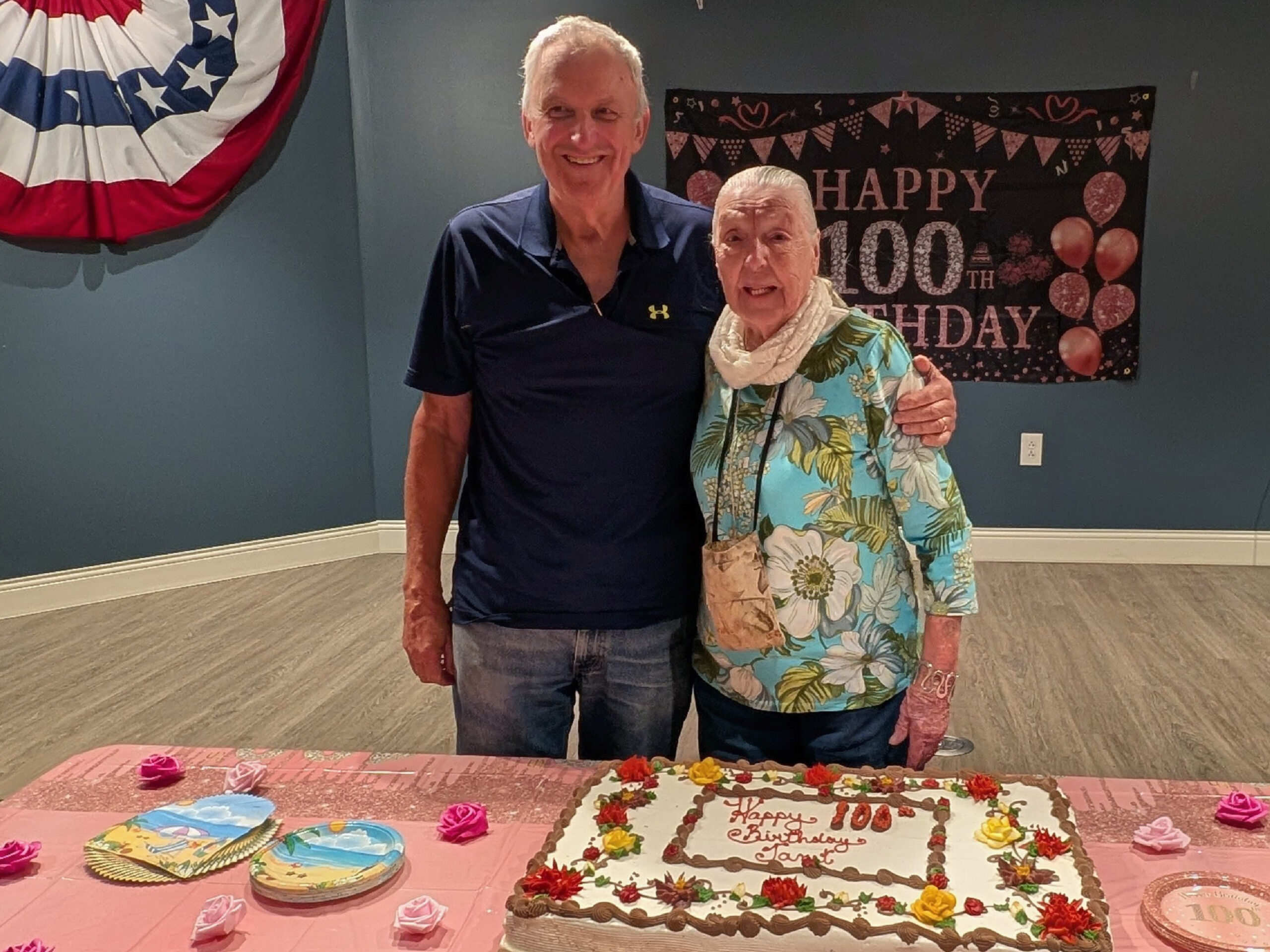WEL resident Janet and her son at her 100th birthday party