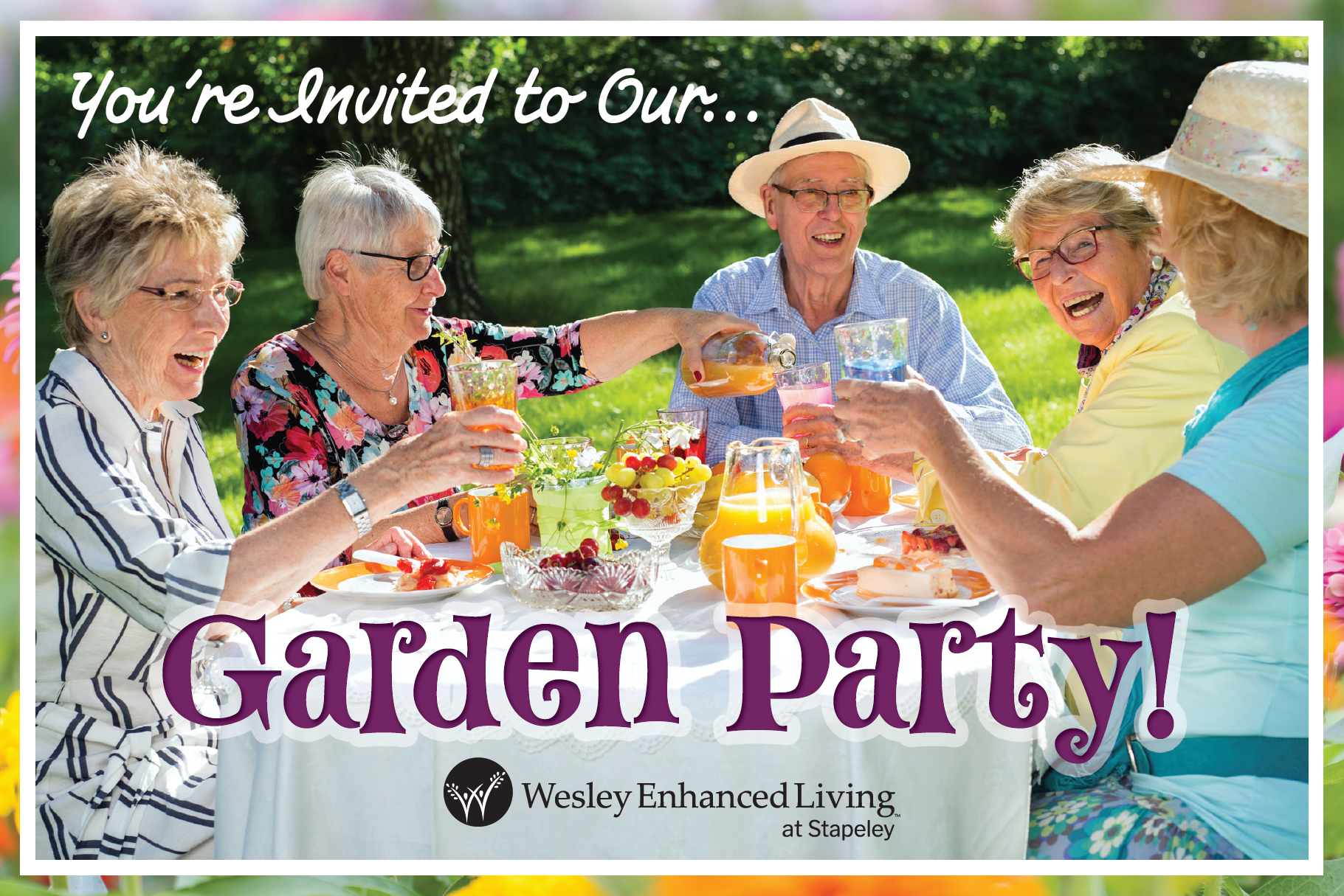 Seniors gathered for a garden party picnic with food & drinks